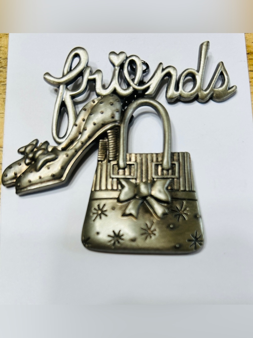 Pendant or wore as a brooch “friends”. Very detailed purse & shoes.